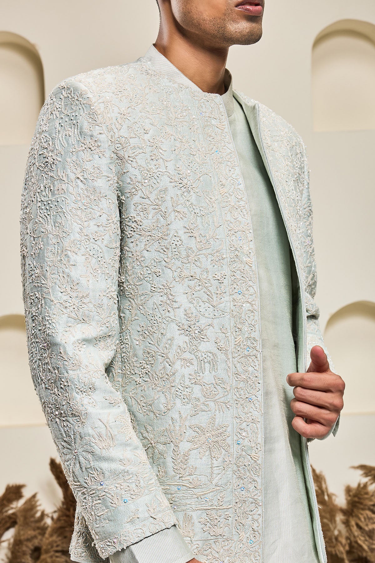 Iceblue open bandhgala 
with thread , sequins & pearl
work