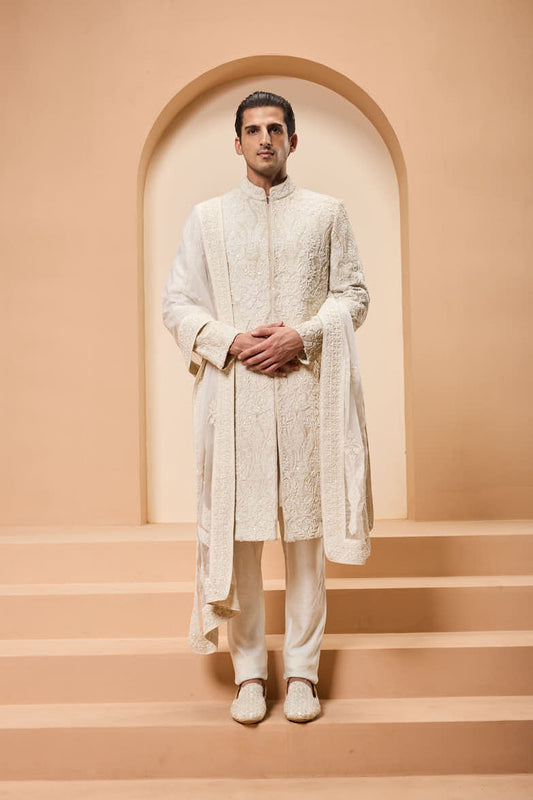 Ivory sherwani detailing with pearl,sequins and aplic work