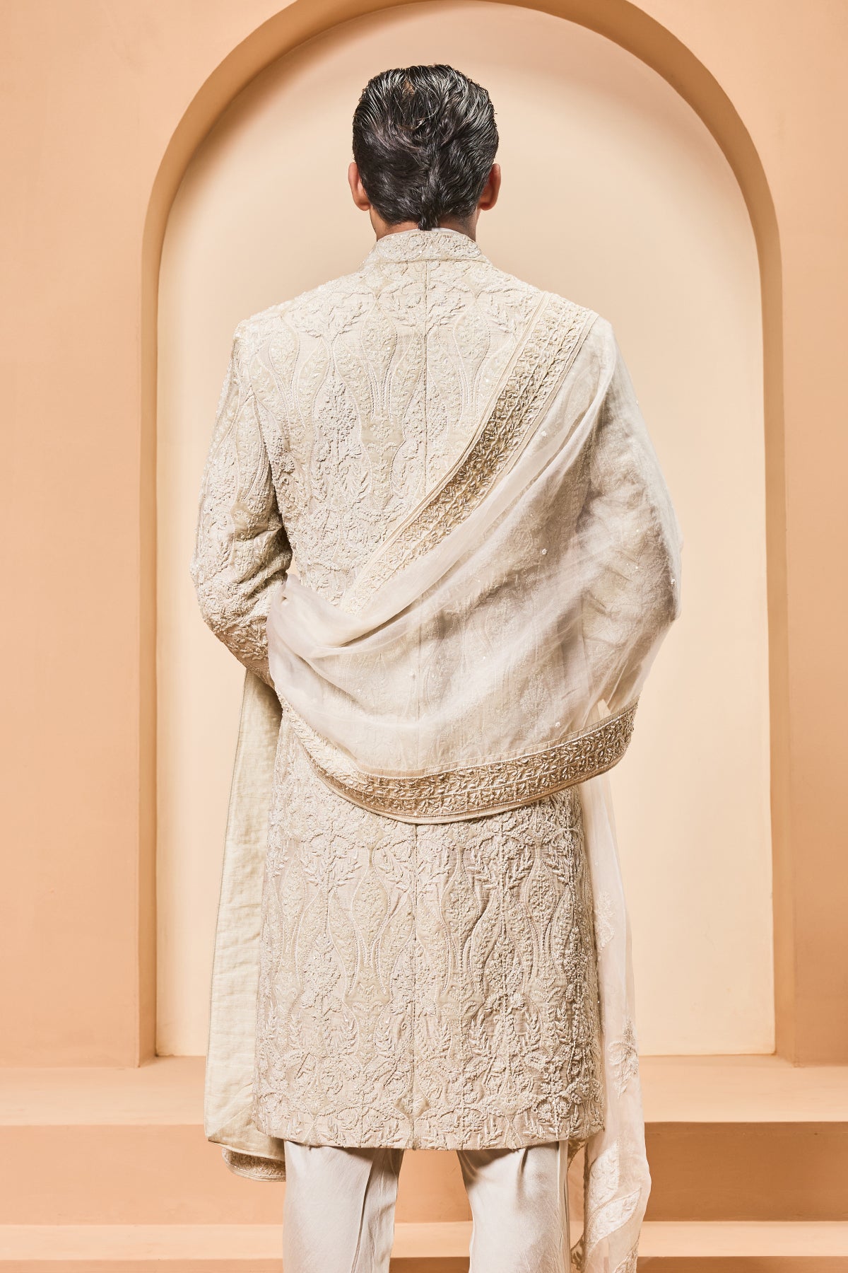Ivory sherwani detailing with pearl,sequins and aplic work