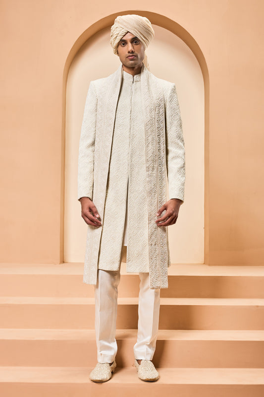 Ivory sherwani detailing with pearl,sequins and thread work