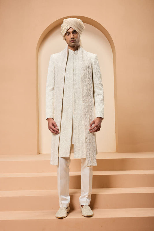 Ivory sherwani detailing with pearl,sequins and thread work