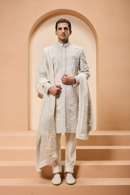 Ivory sherwani detailing with silver zari,pearl,sequins and thread work