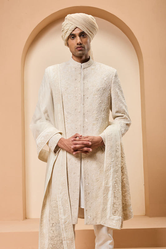 Ivory sherwani detailing with pearl,sequins and thread work