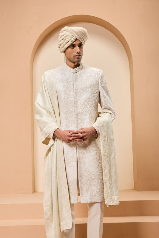 Ivory sherwani detailing with pearl,sequins and thread work