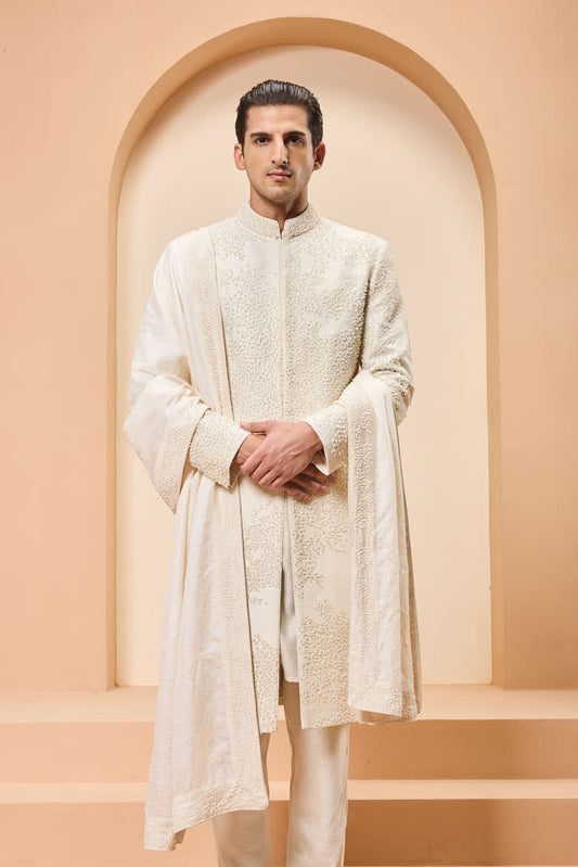 Ivory sherwani detailing with pearl,cutdana and thread work