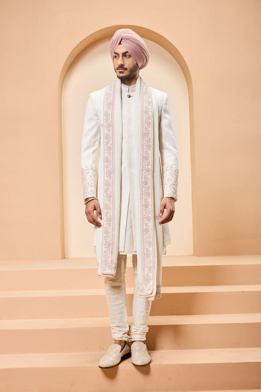 Ivory sherwani detailing with sequins and with thread work