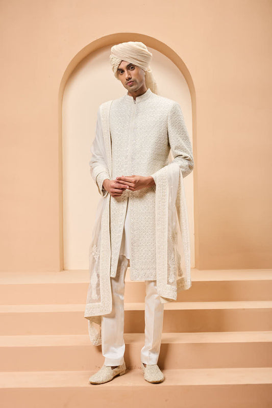 Ivory sherwani detailing with pearl, rainbow sequins and thread work
