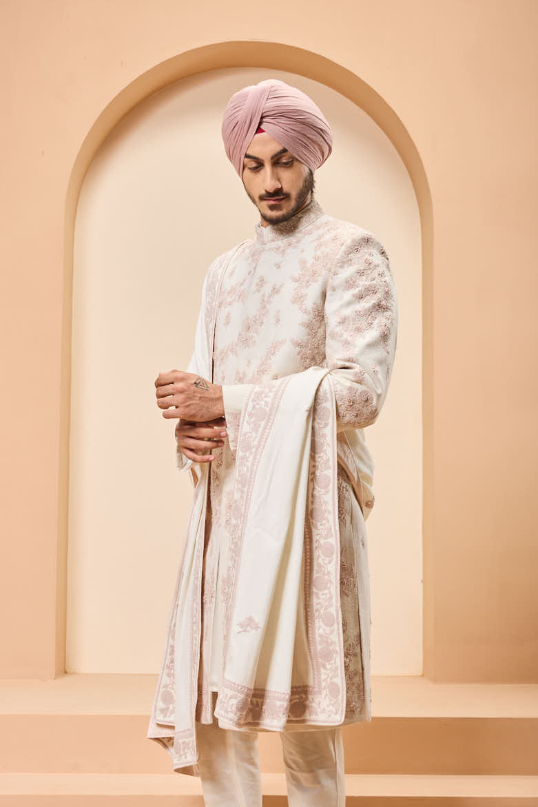Ivory sherwani detailing with pearl,sequins and thread work