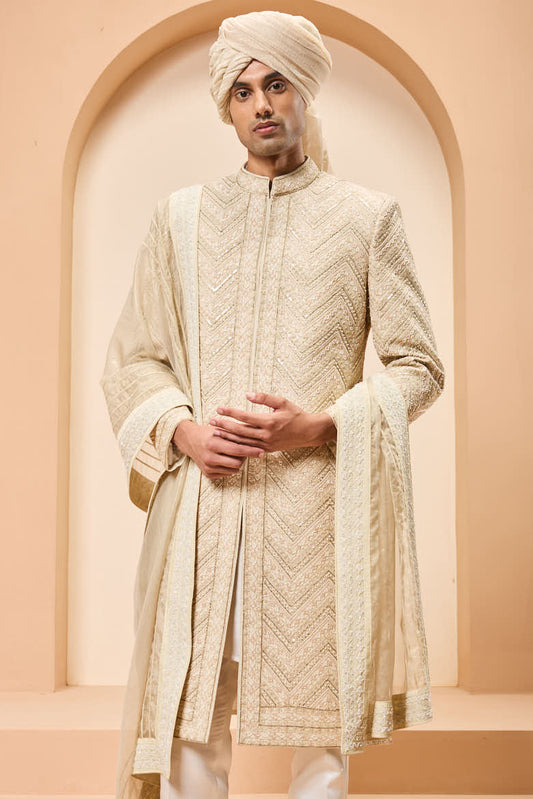 Ivory gold sherwani detailing with zardozi,pearl,sequins and thread work