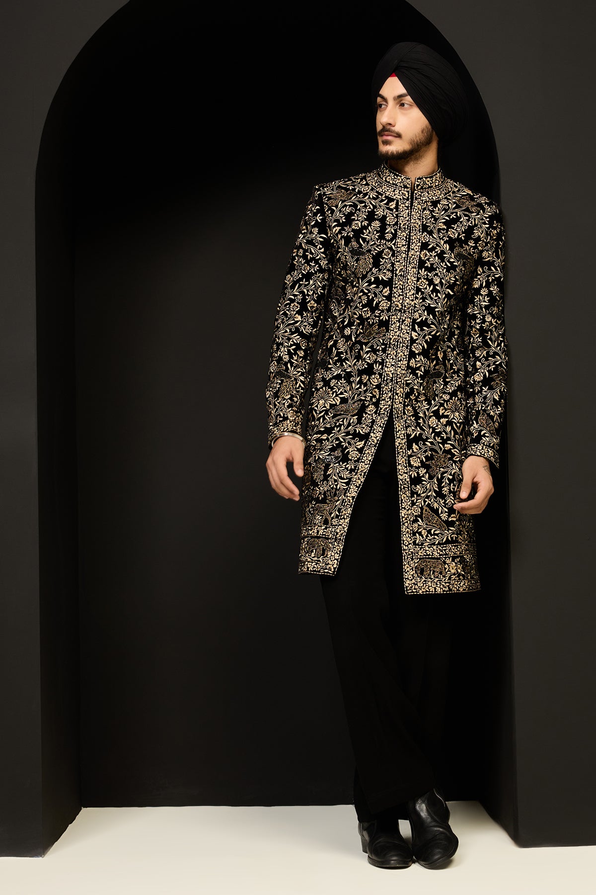 Black indo Western highlighting with gold zari, sequins, pearl and cutdana