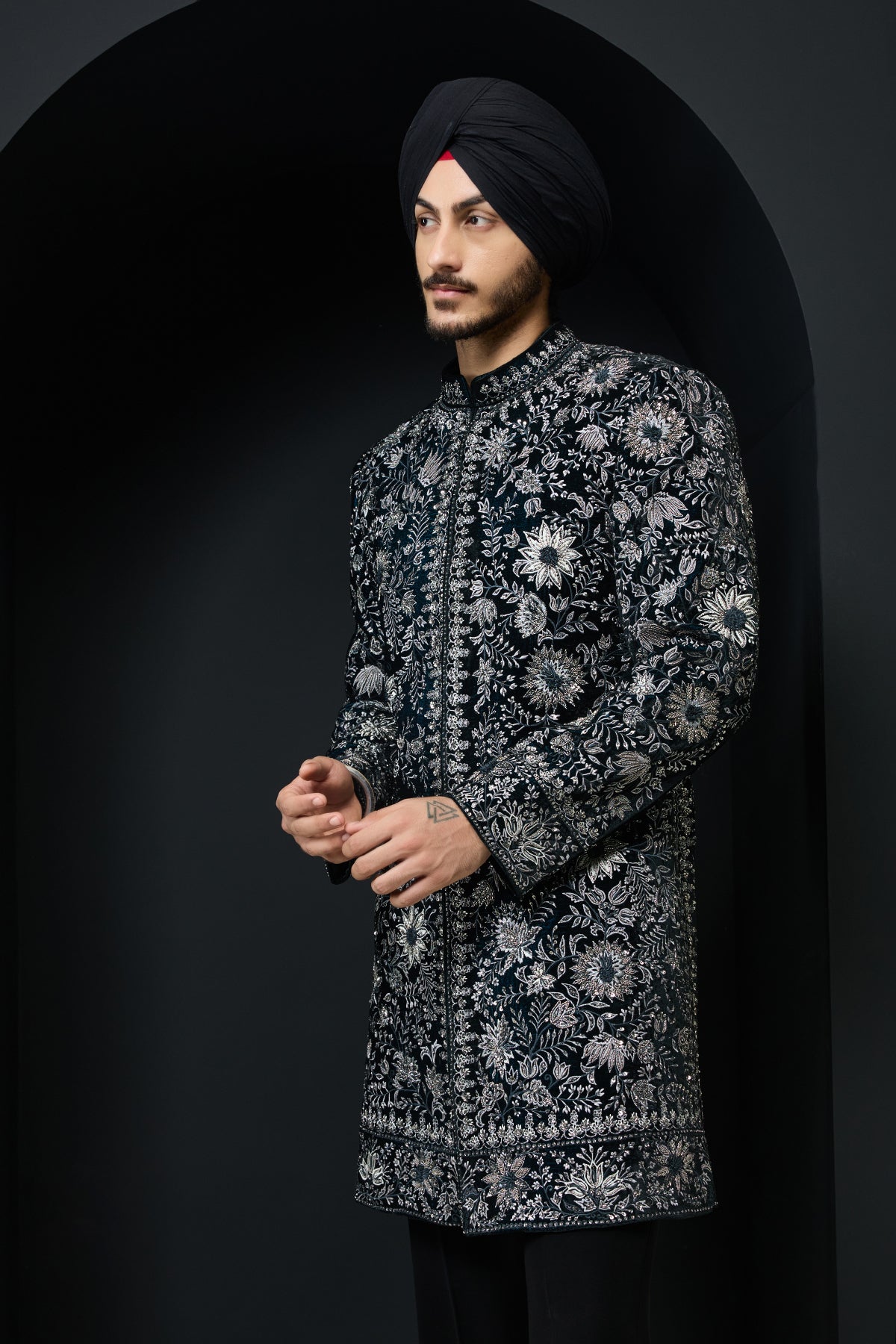 Teal Indo Western highlighted with pearl, sequins ,cutdana and spring thread work
