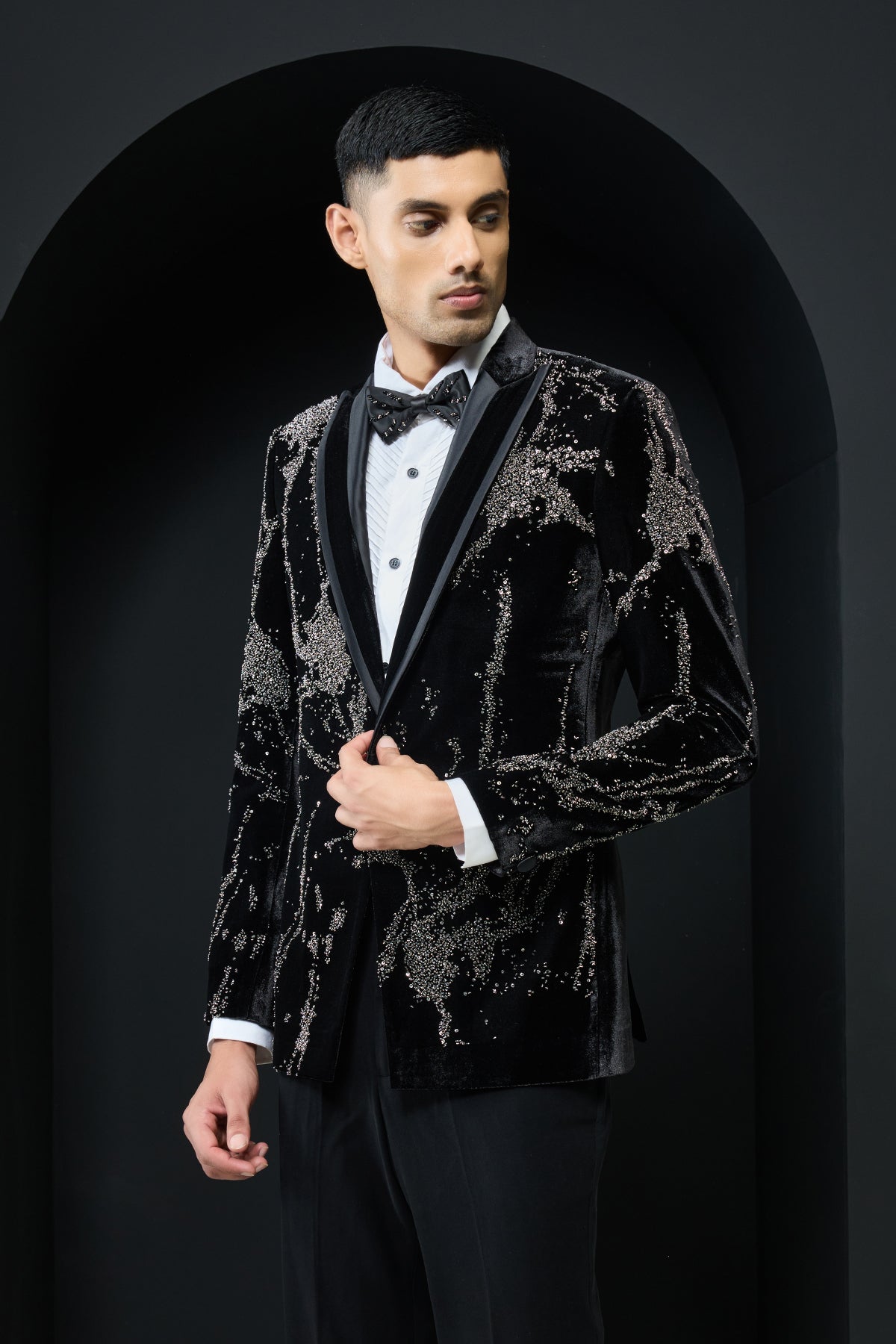 Black tuxedo highlighted with sequins, pearls and cutdana