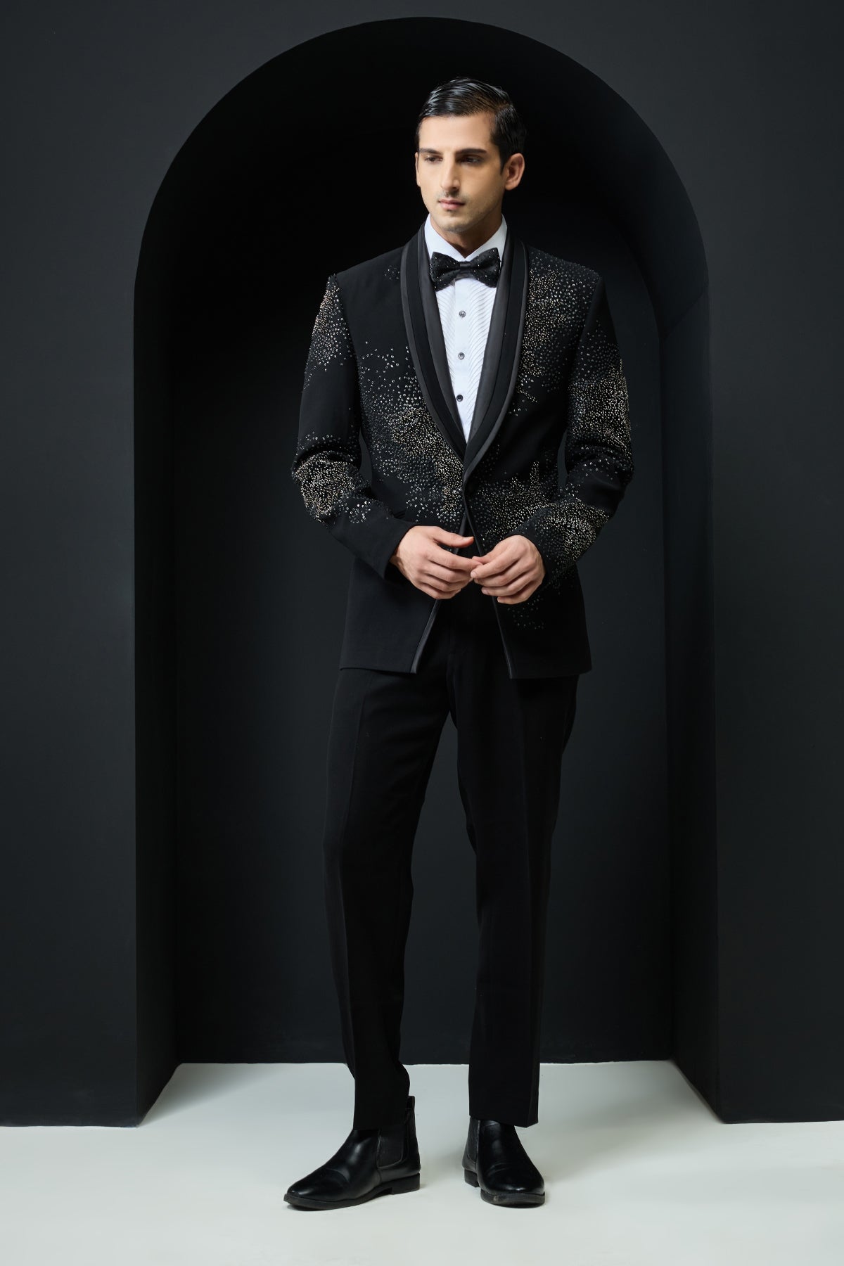 Black tuxedo highlighted with sequins, pearls,cutdana