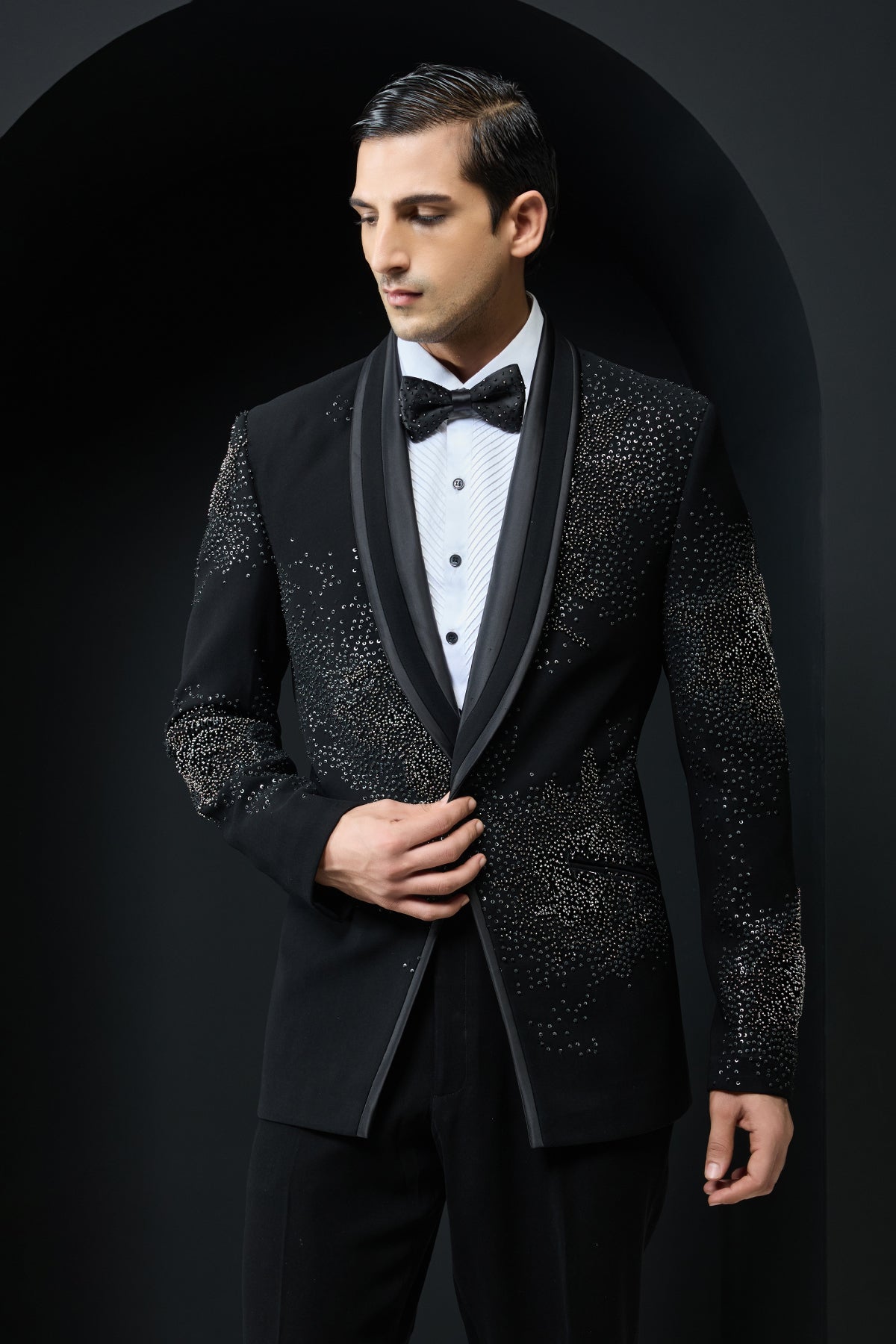 Black tuxedo highlighted with sequins, pearls,cutdana
