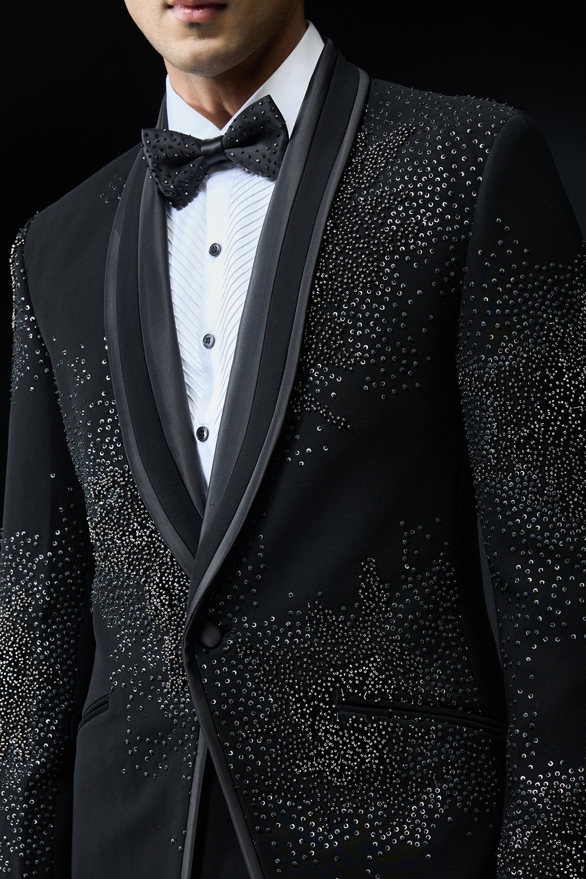 Black tuxedo highlighted with sequins, pearls,cutdana