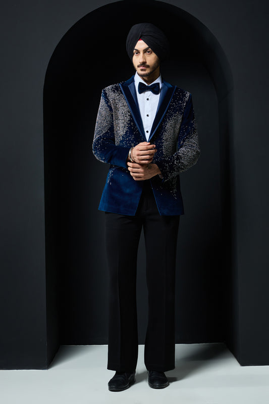 Teal blue tuxedo highlighted with sequins, pearls and cutdana