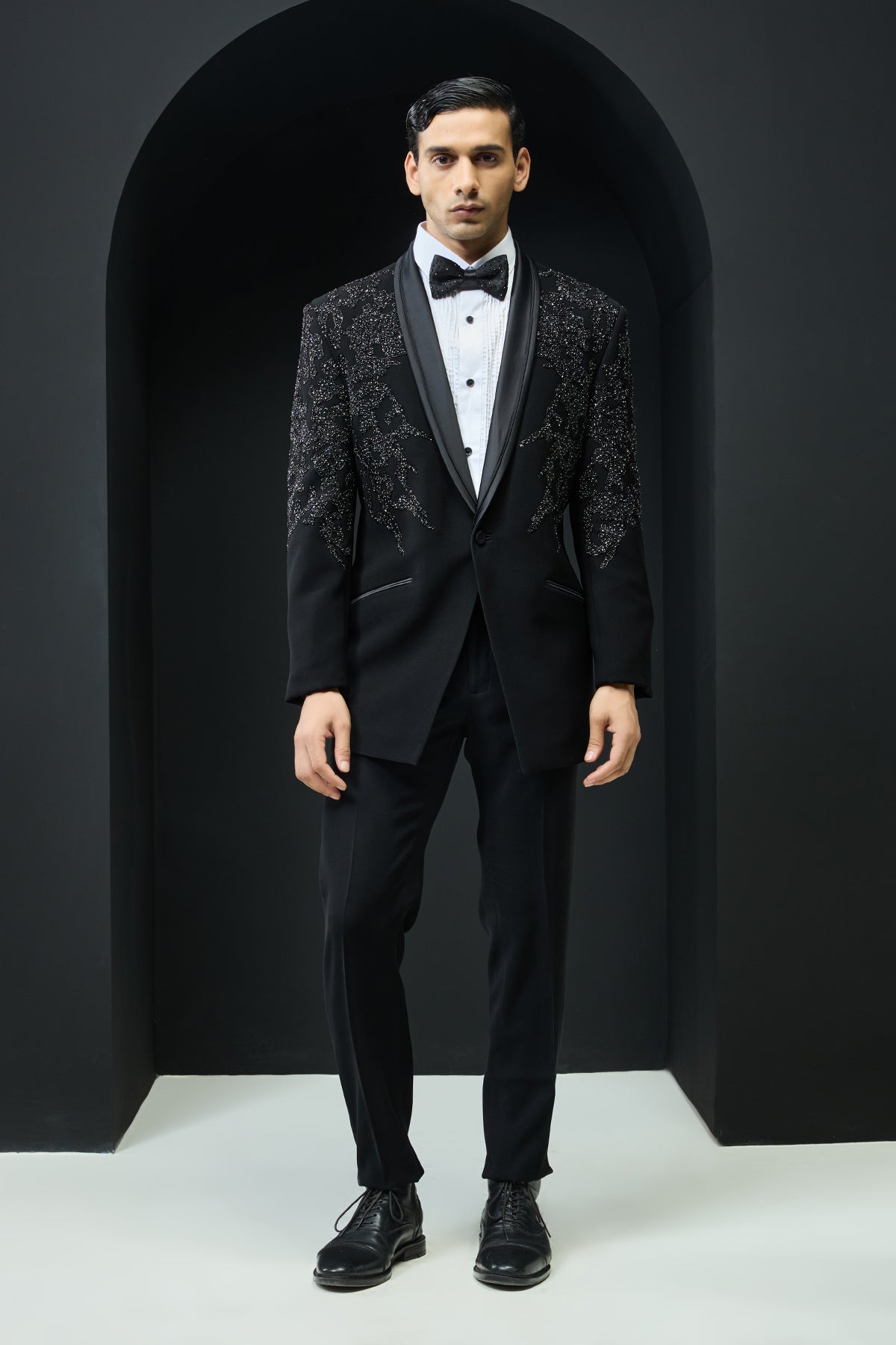 Black tuxedo highlighted with sequins, pearls,cutdana
