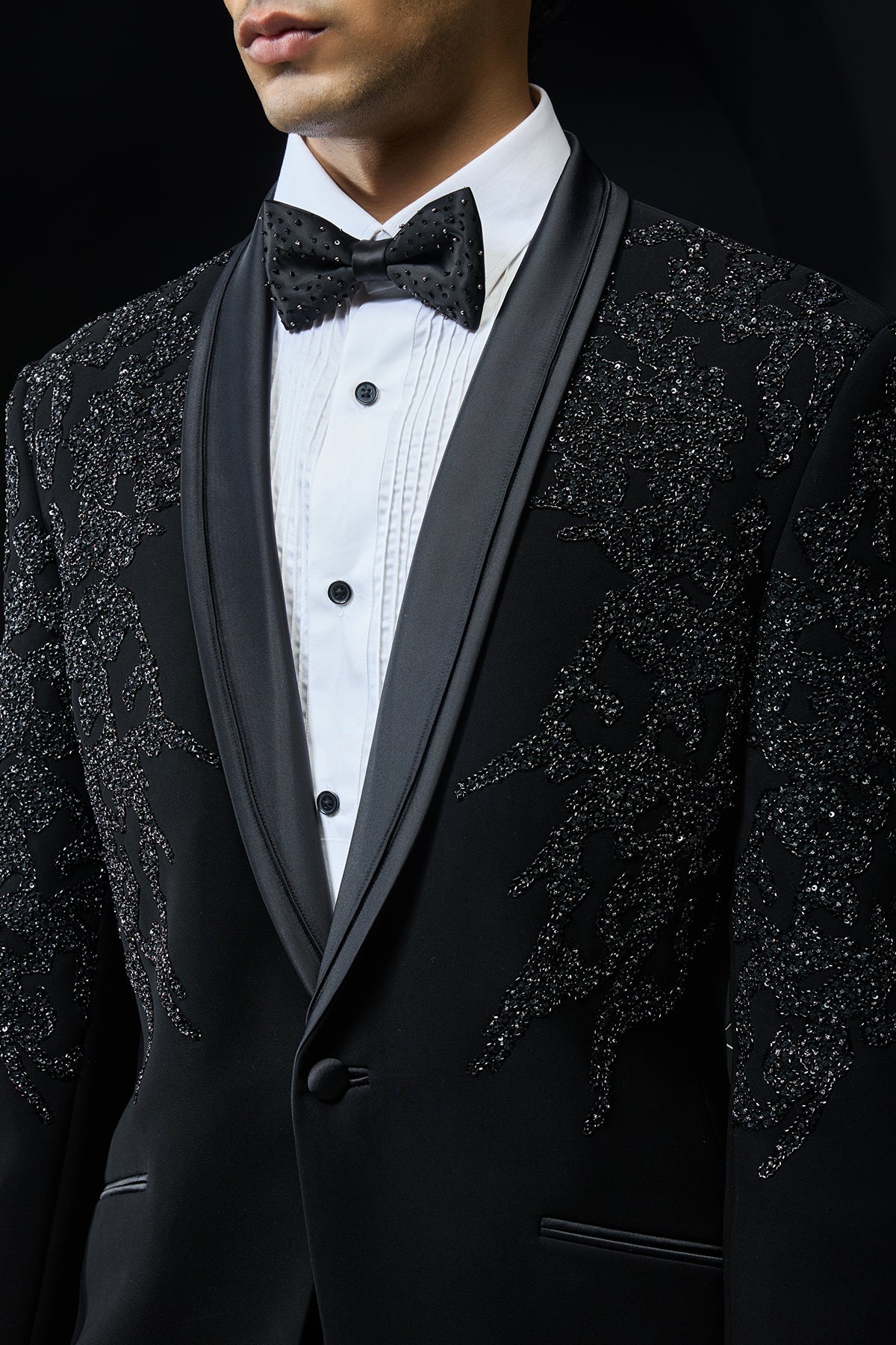 Black tuxedo highlighted with sequins, pearls,cutdana