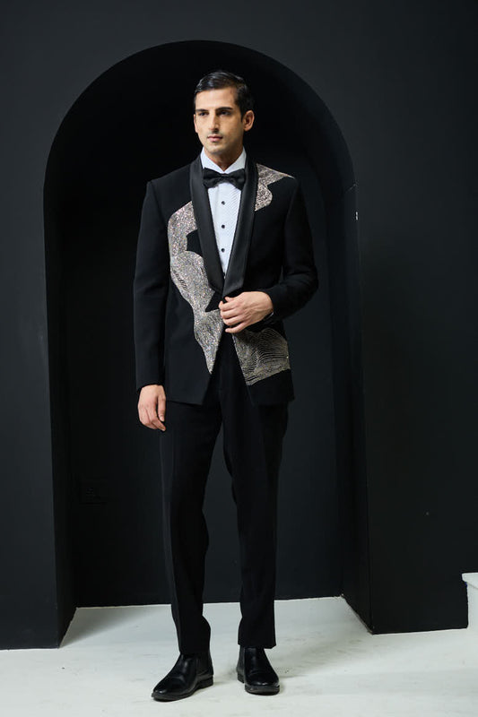 Black tuxedo highlighted with silver zari , cutdana and peals