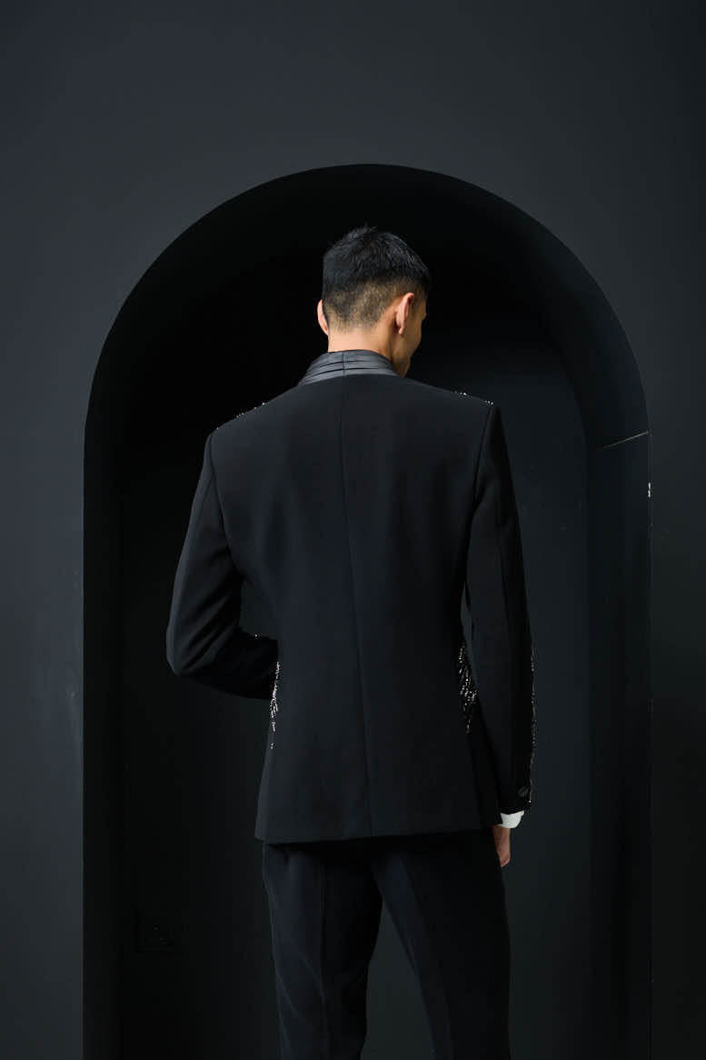 Black tuxedo highlighted with pearls and cutdana