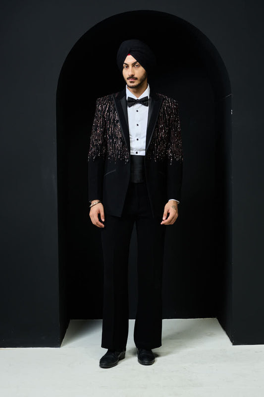 Black tuxedo highlighted with pearls, sequins and thread work