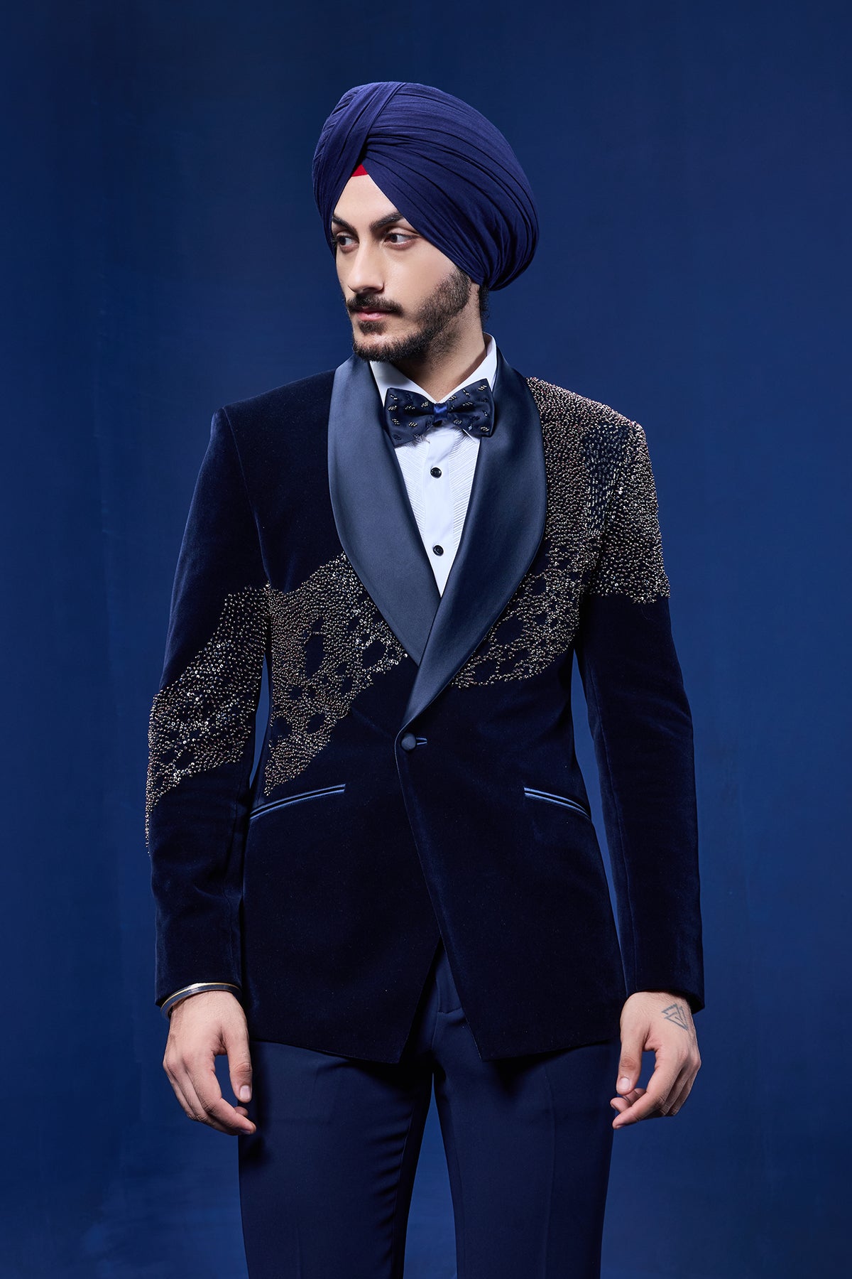 Navy Blue tuxedo highlighted with pearls, sequins, cutdana and thread work