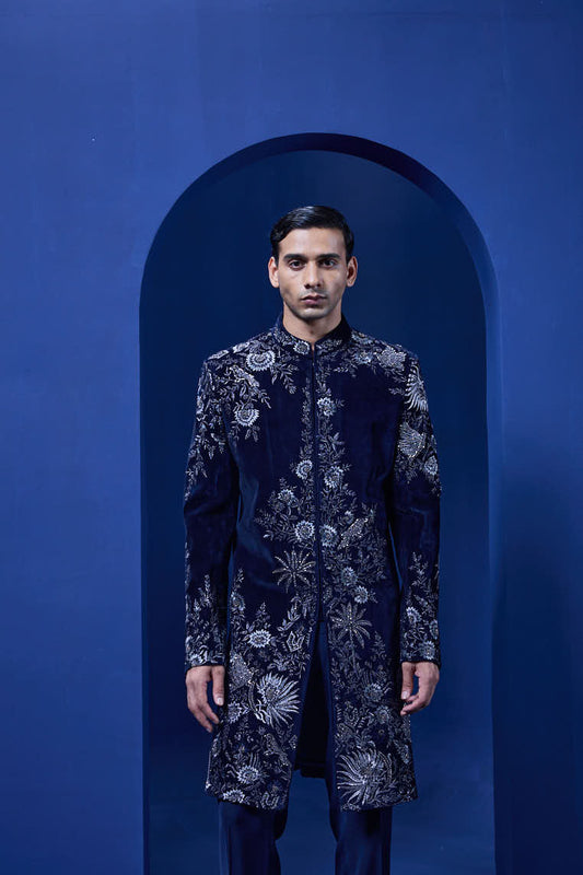 Navy blue Indo Western highlighted with silver zari, pearl and cutdana