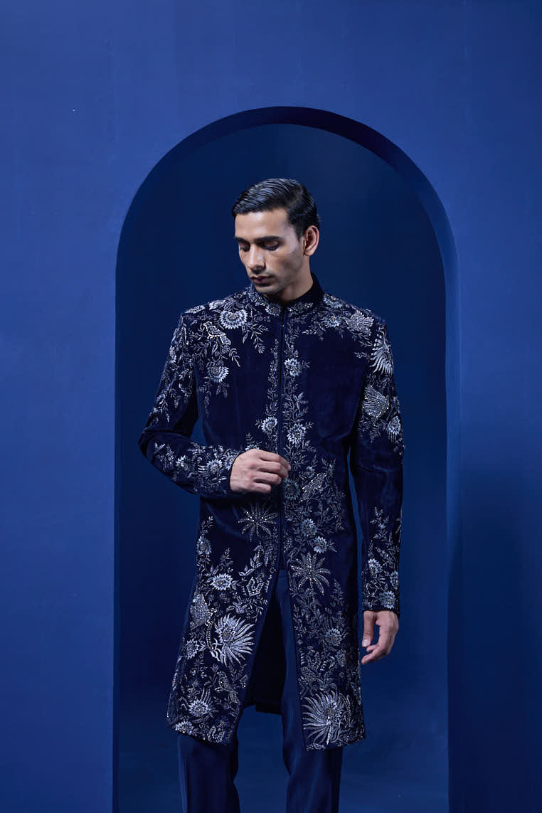 Navy blue Indo Western highlighted with silver zari, pearl and cutdana