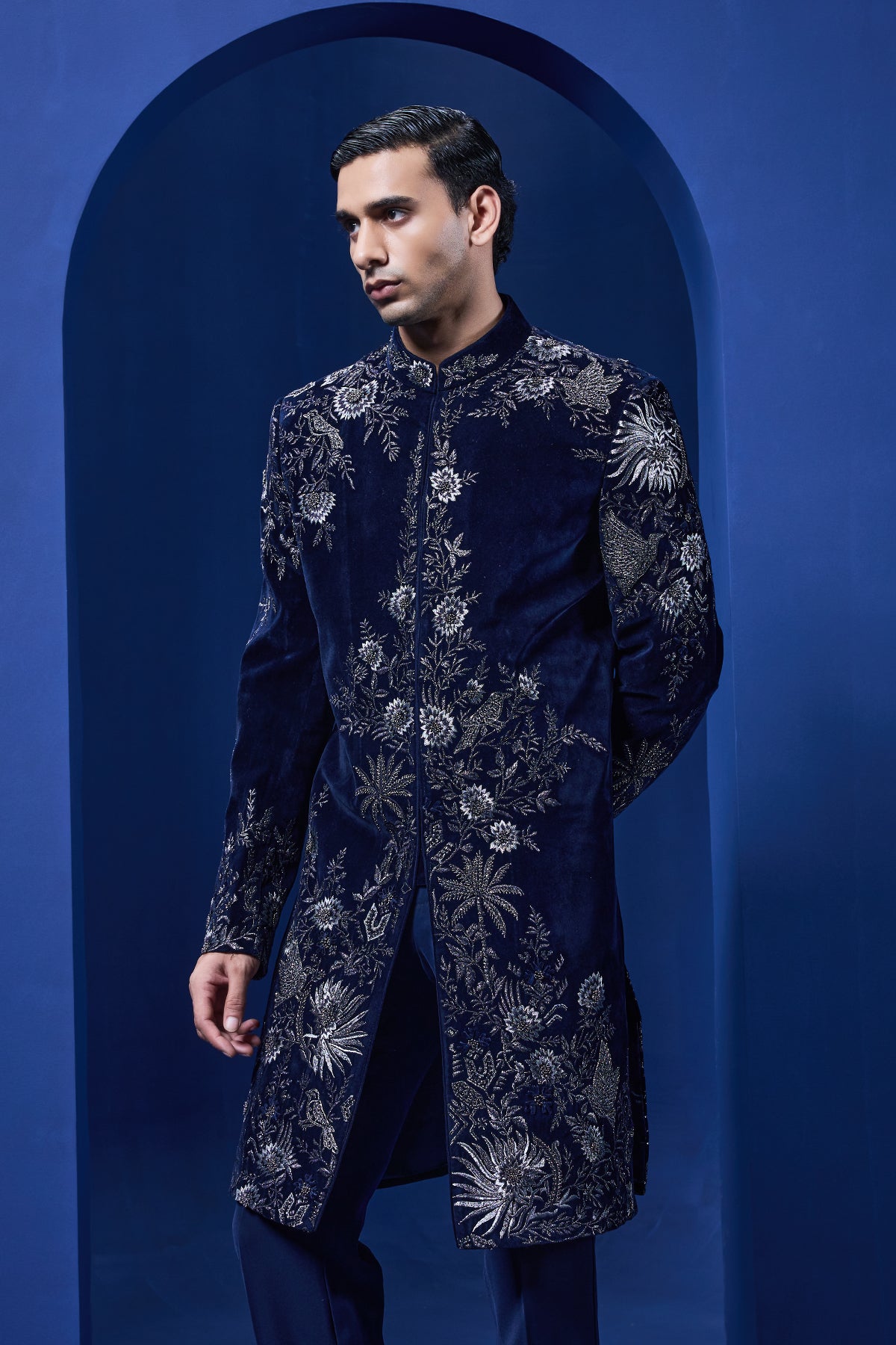 Navy blue Indo Western highlighted with silver zari, pearl and cutdana