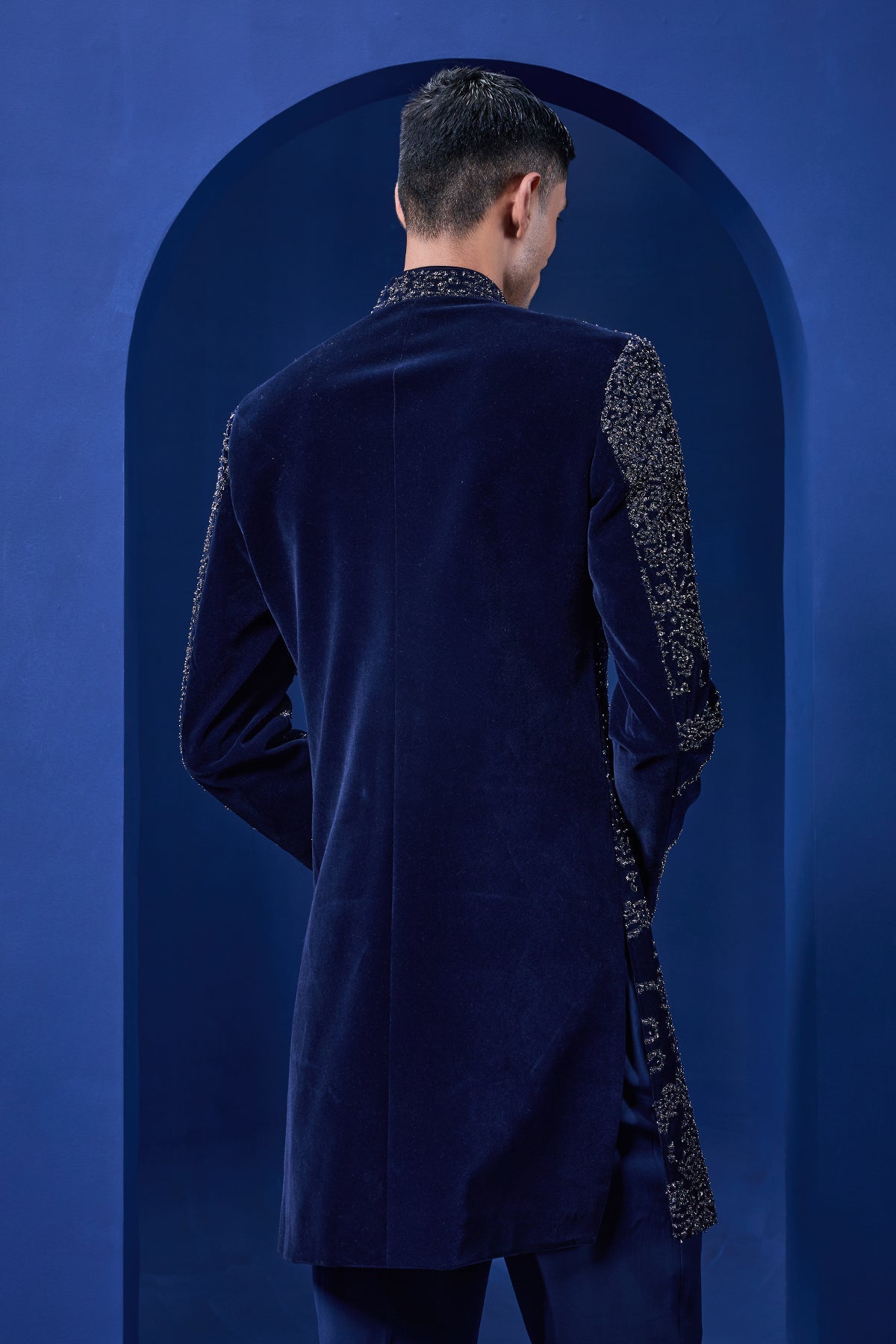 Navy blue Indo Western highlighted with silver zari, sequins,pearl and cutdana