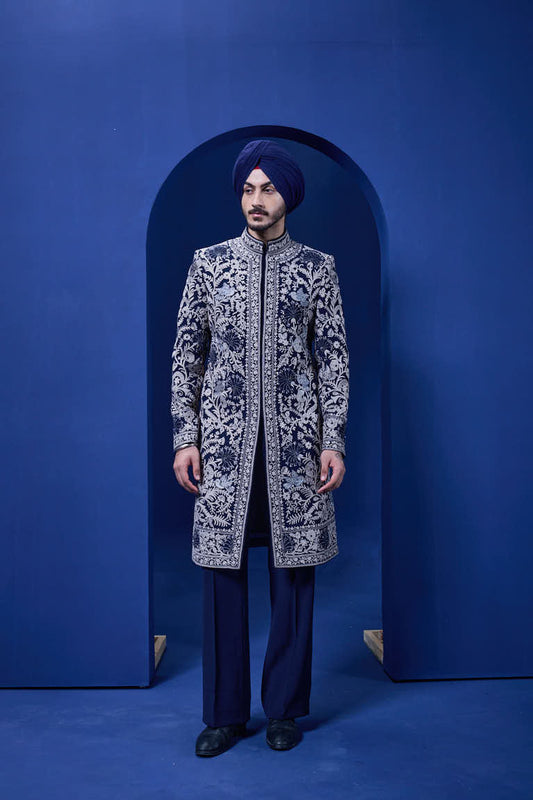 Navy blue Indo Western highlighted with sequins, pearls and thread work