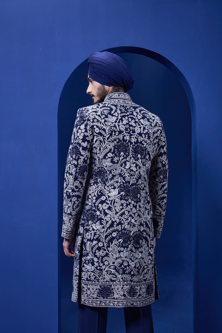 Navy blue Indo Western highlighted with sequins, pearls and thread work