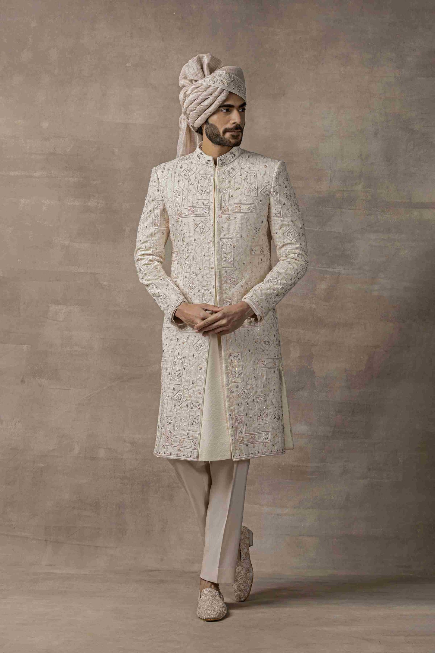 Ivory Sherwani With Pink Embroidery Highlighted With Sequin
