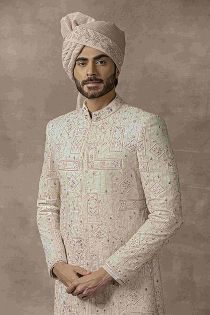 Ivory Sherwani With Pink Embroidery Highlighted With Sequin