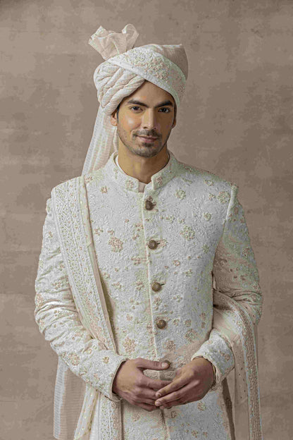 Ivory Sherwani Highlighted With Velvet Cut