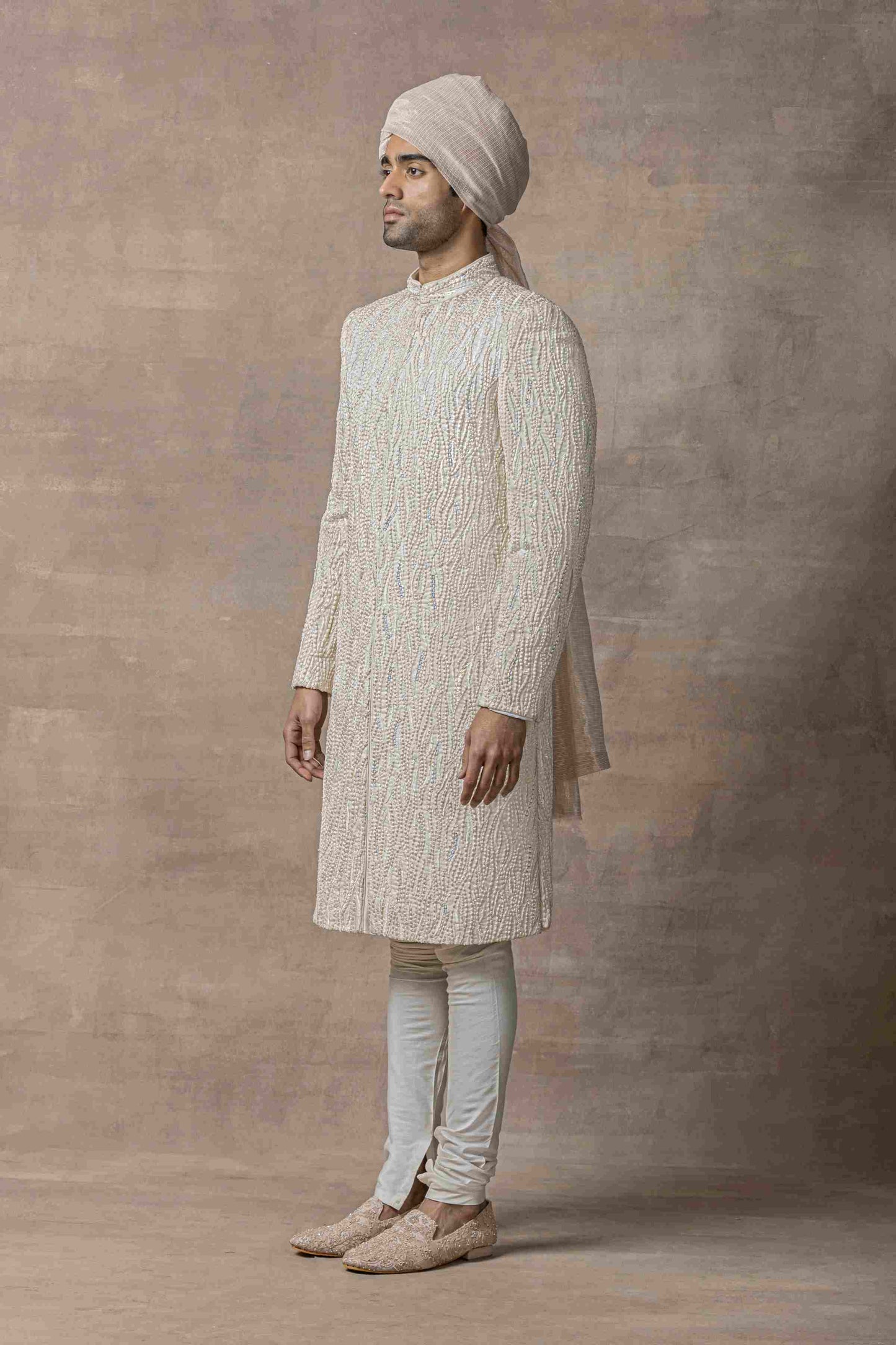 Off White Sherwani Highlighted With Thread , Pearl And Multi Coloured Sequin